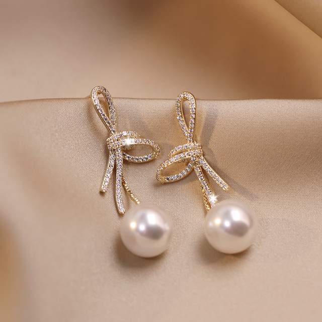 Golden Bow Pearl Drop Earrings
