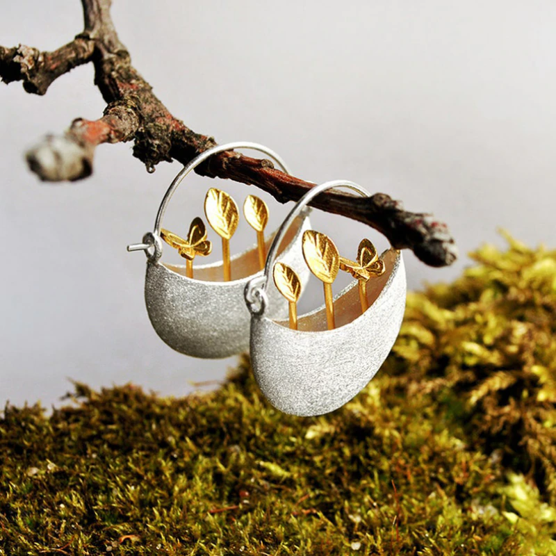 Gilded Bloom Cradle Silver Earrings
