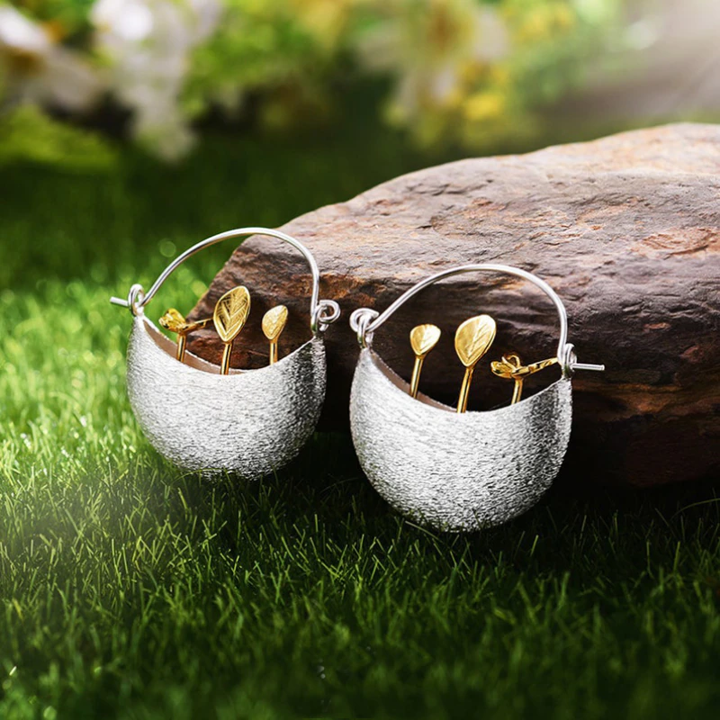 Gilded Bloom Cradle Silver Earrings